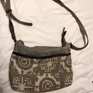 Myra handbag, approximately 12 inches wide, 6 inches tall (base)